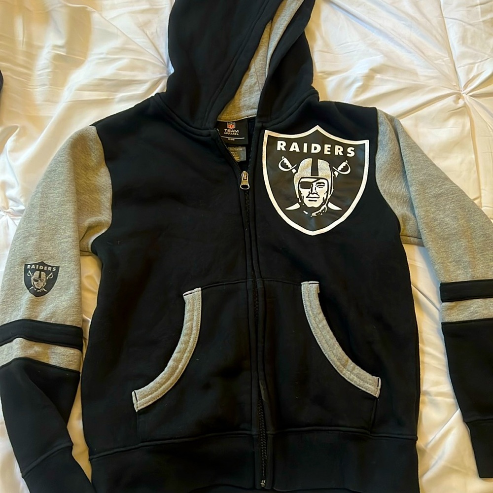 Raiders Zip up Jacket, kids size 7. NFL Apparel
